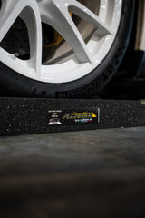 Close-up of front tyre cradled by an ALTairEGO cushion